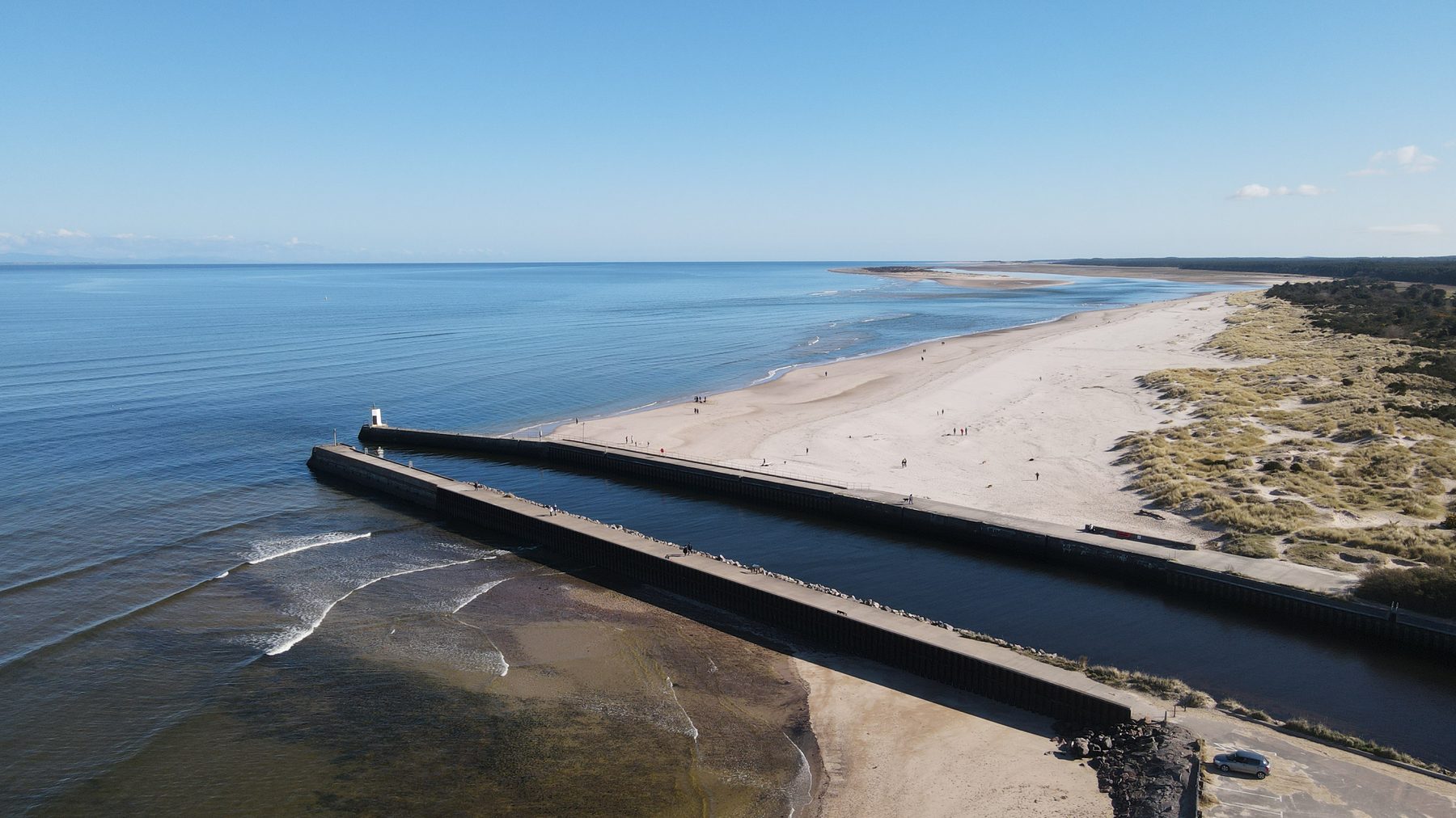 Aerial view of Nairn harbour pier and beach
